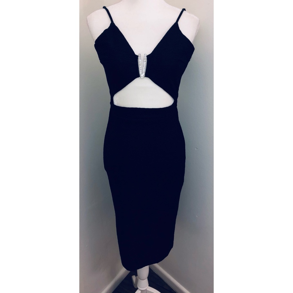 Little black dress with cutouts